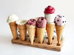 Old ice cream cones transformed into eco-friendly storage racks.